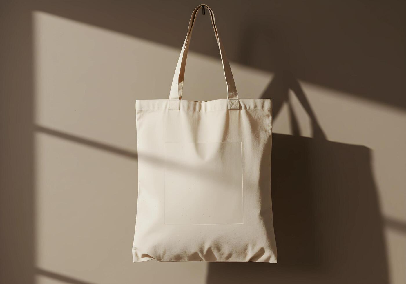 Hanging Beige Tote Bag Mockup with Window Light and Minimal Style photo
