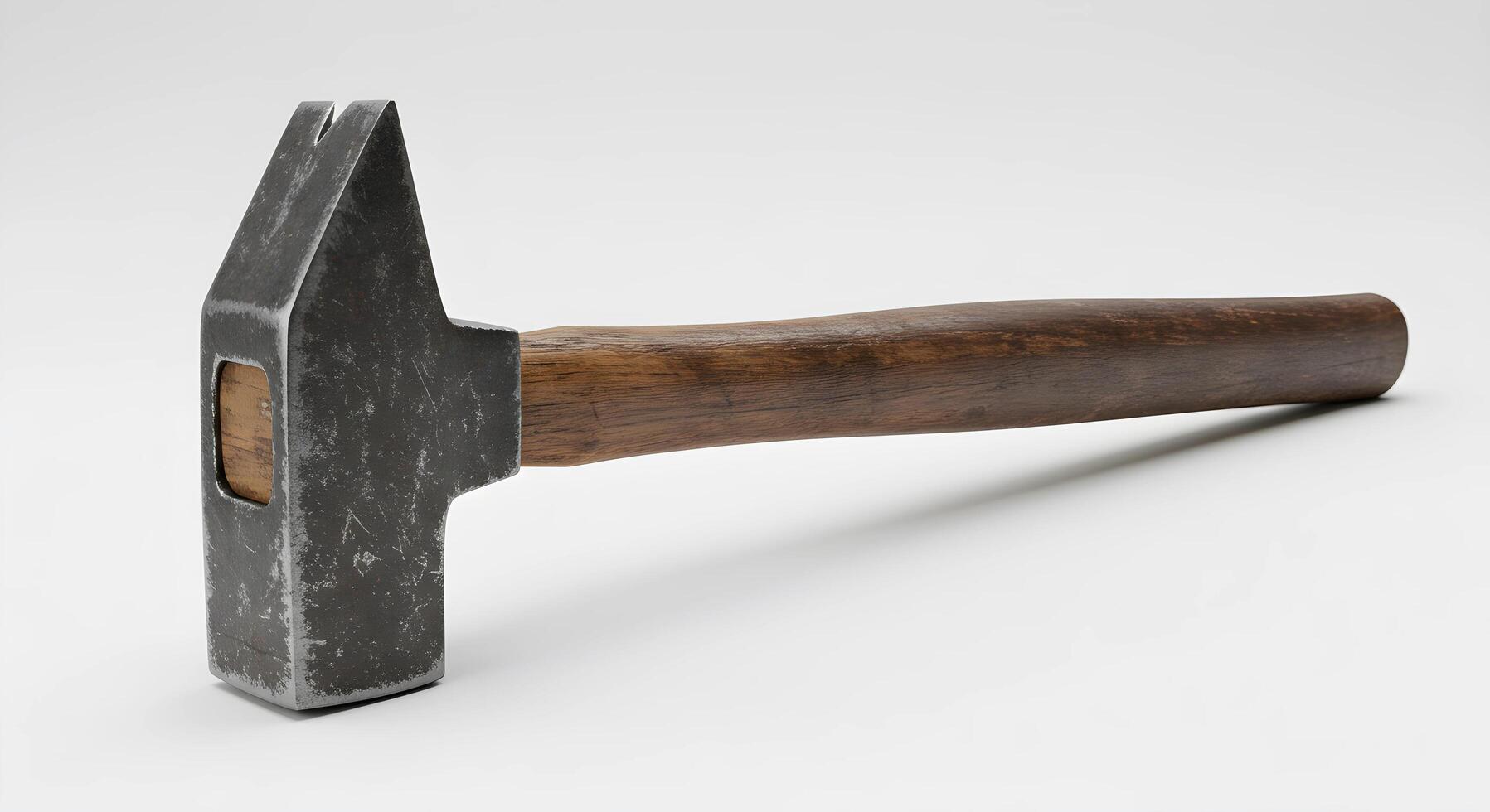Close-up of Hammer Resting on White Background with Wooden Handle photo