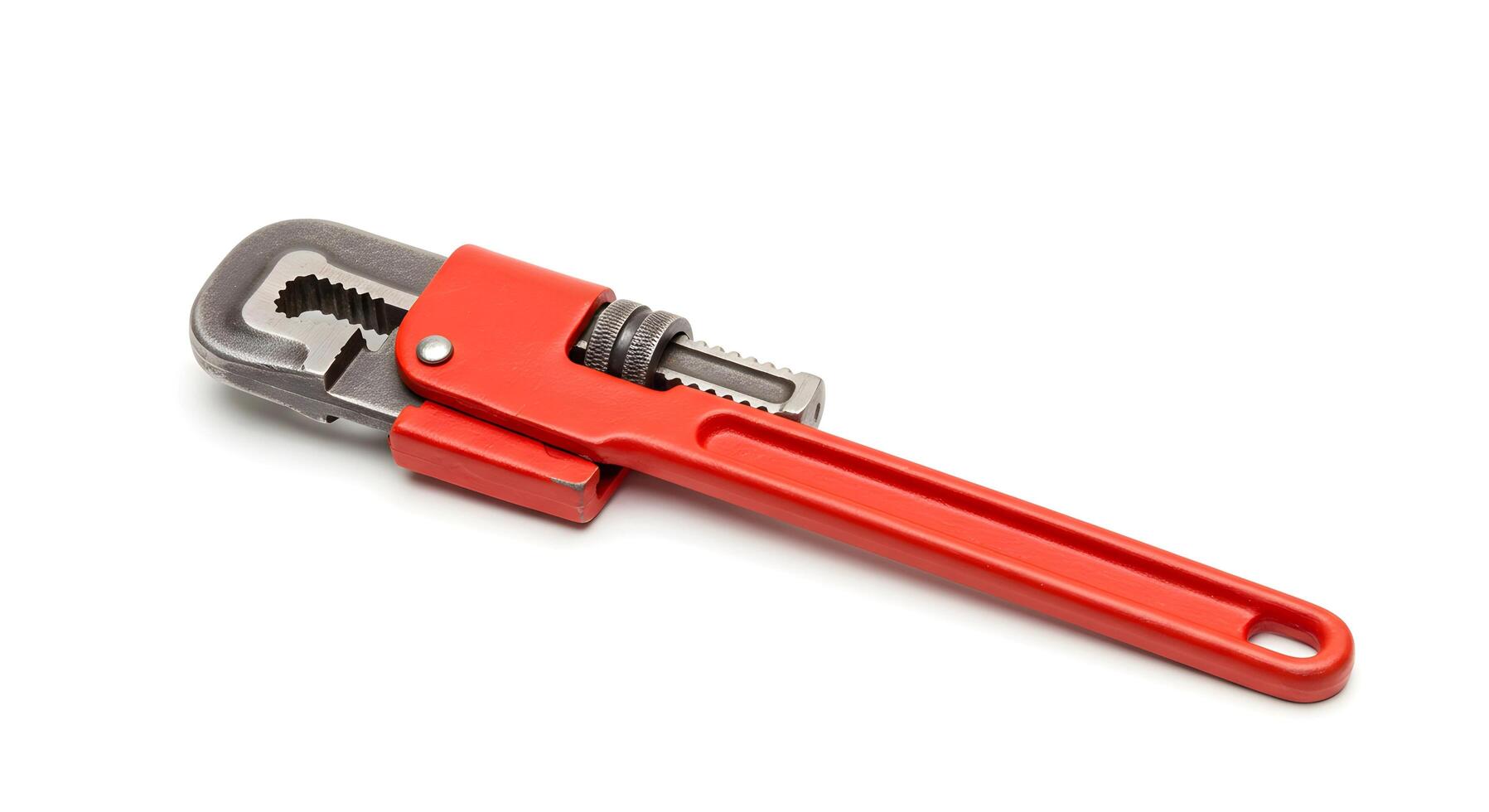 Red Pipe Wrench on White Background for Plumbing and Repair Work photo