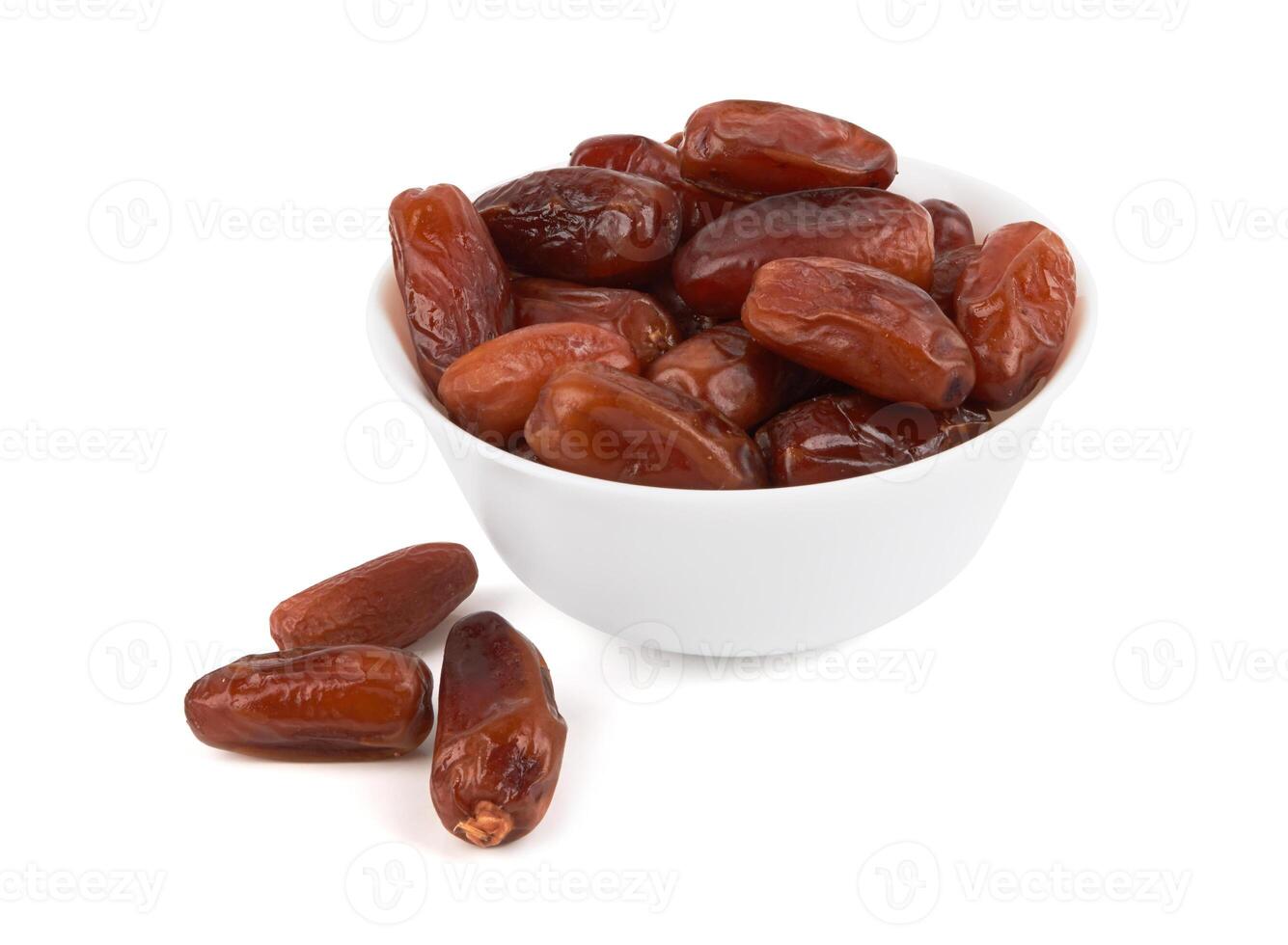 Dates isolated on white on white background photo
