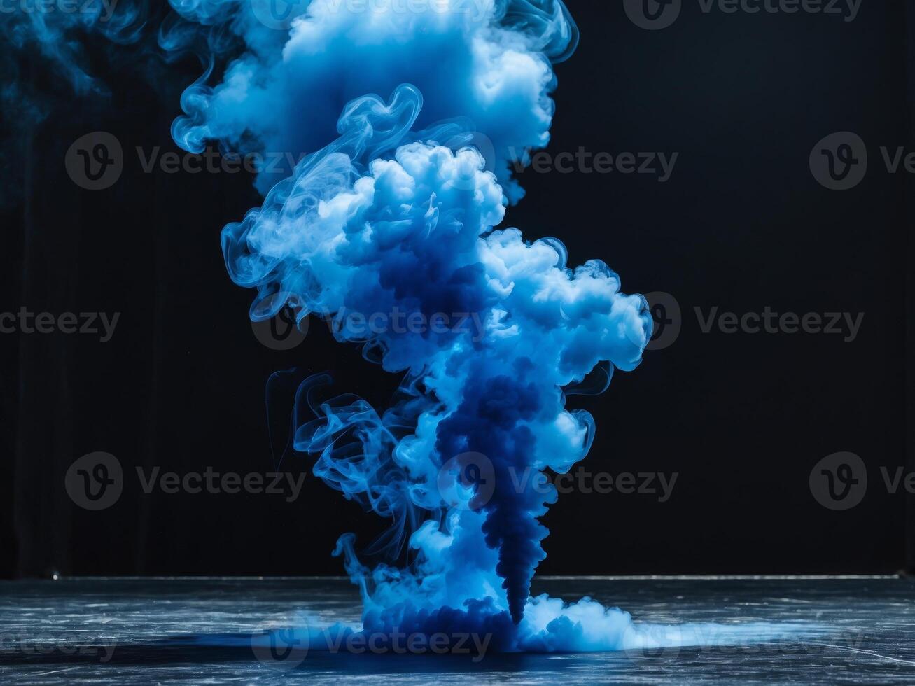 Stage dark background is lit up blue smoke dramatic lighting illuminated photo