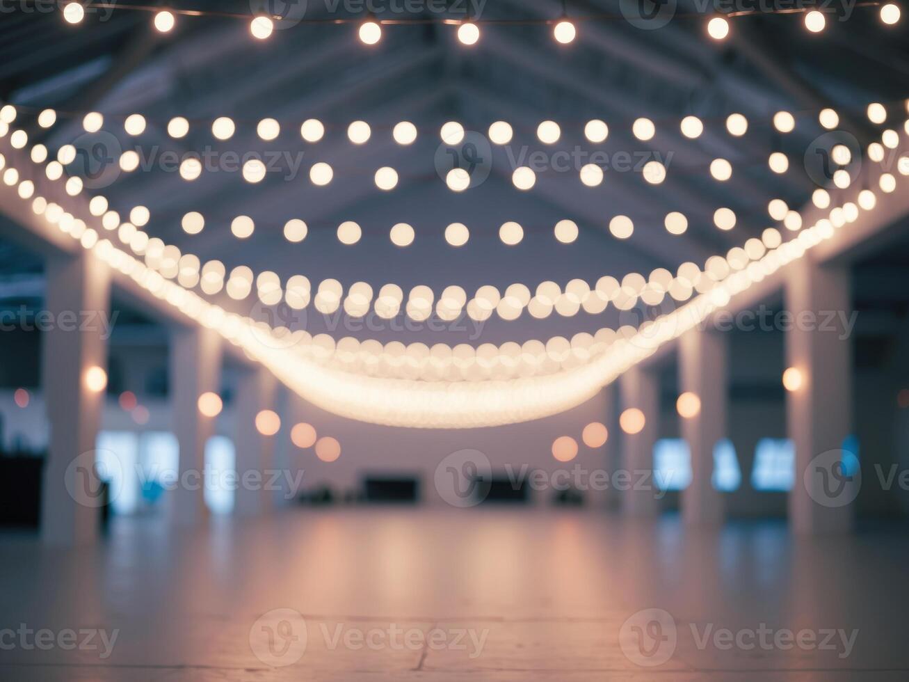 Large open space high ceiling string lights hanging Blurred background of party photo