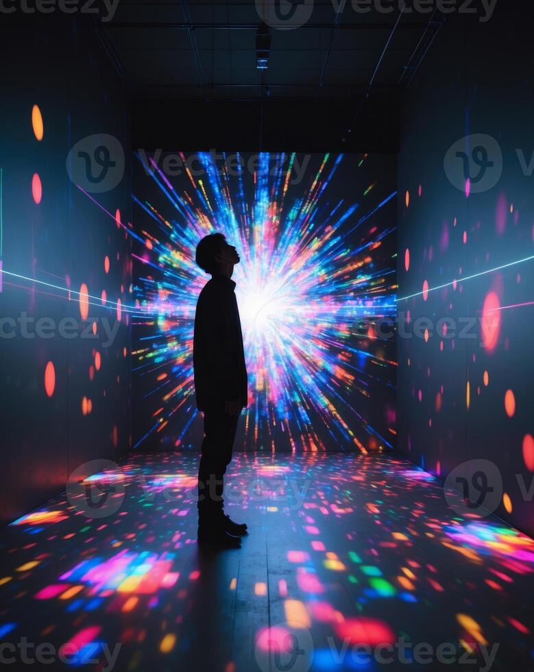 A man standing in front of a colorful light show photo