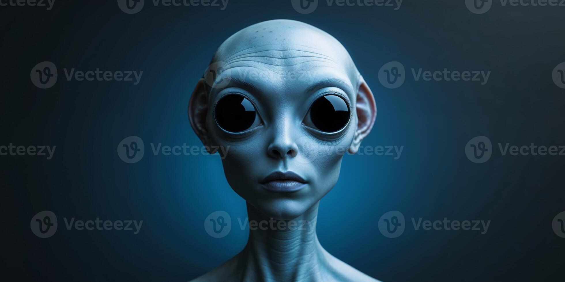 Extraterrestrial being observing with large black eyes and smooth skin. photo