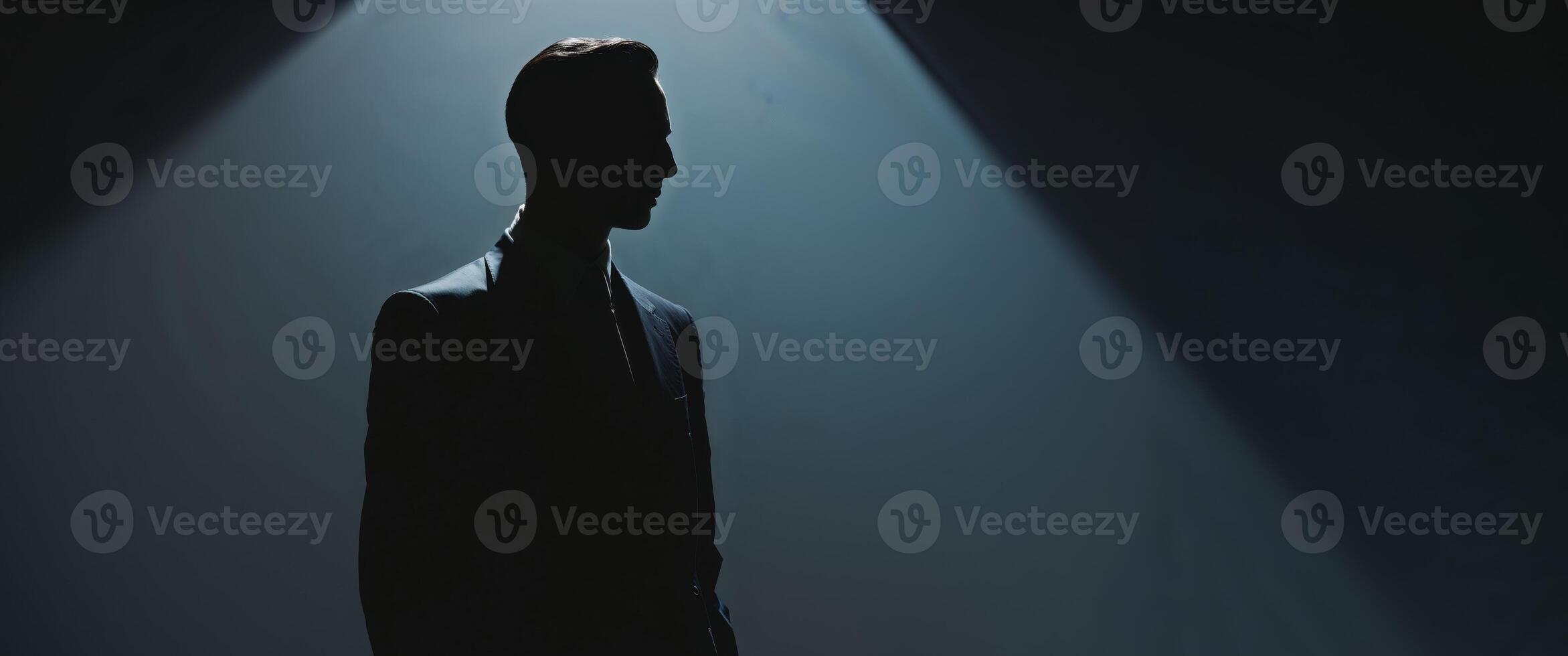 Silhouette in Spotlight with Dramatic Lighting Effects photo