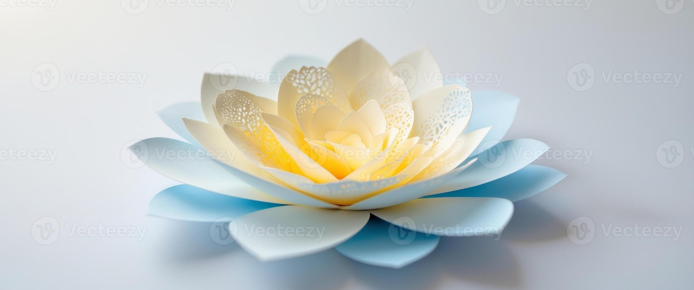 Paper cut out lotus flower on white background photo