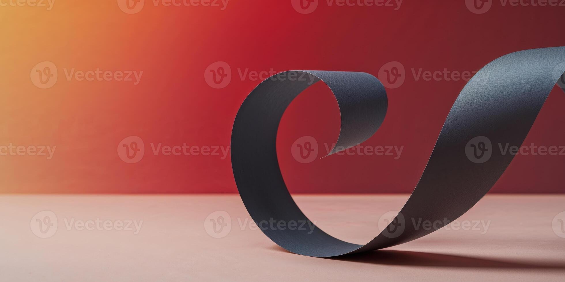 A gradient orange red background with dark curled paper edge. photo
