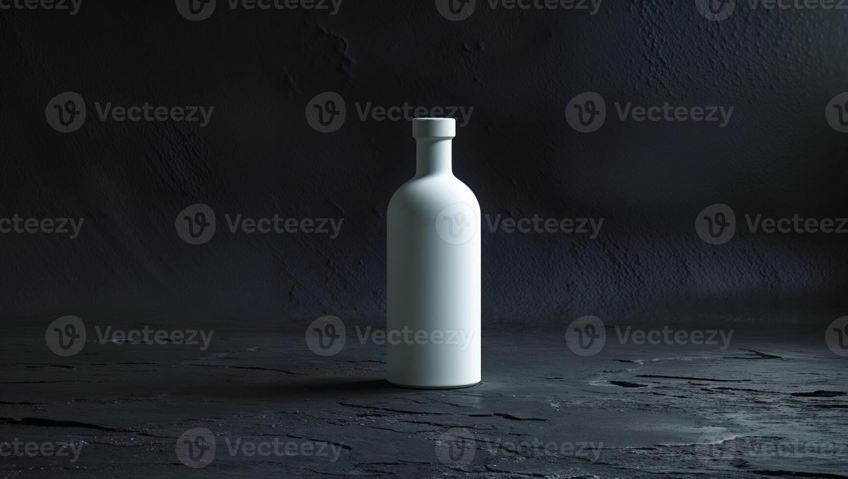 A white bottle sitting on a dark surface photo
