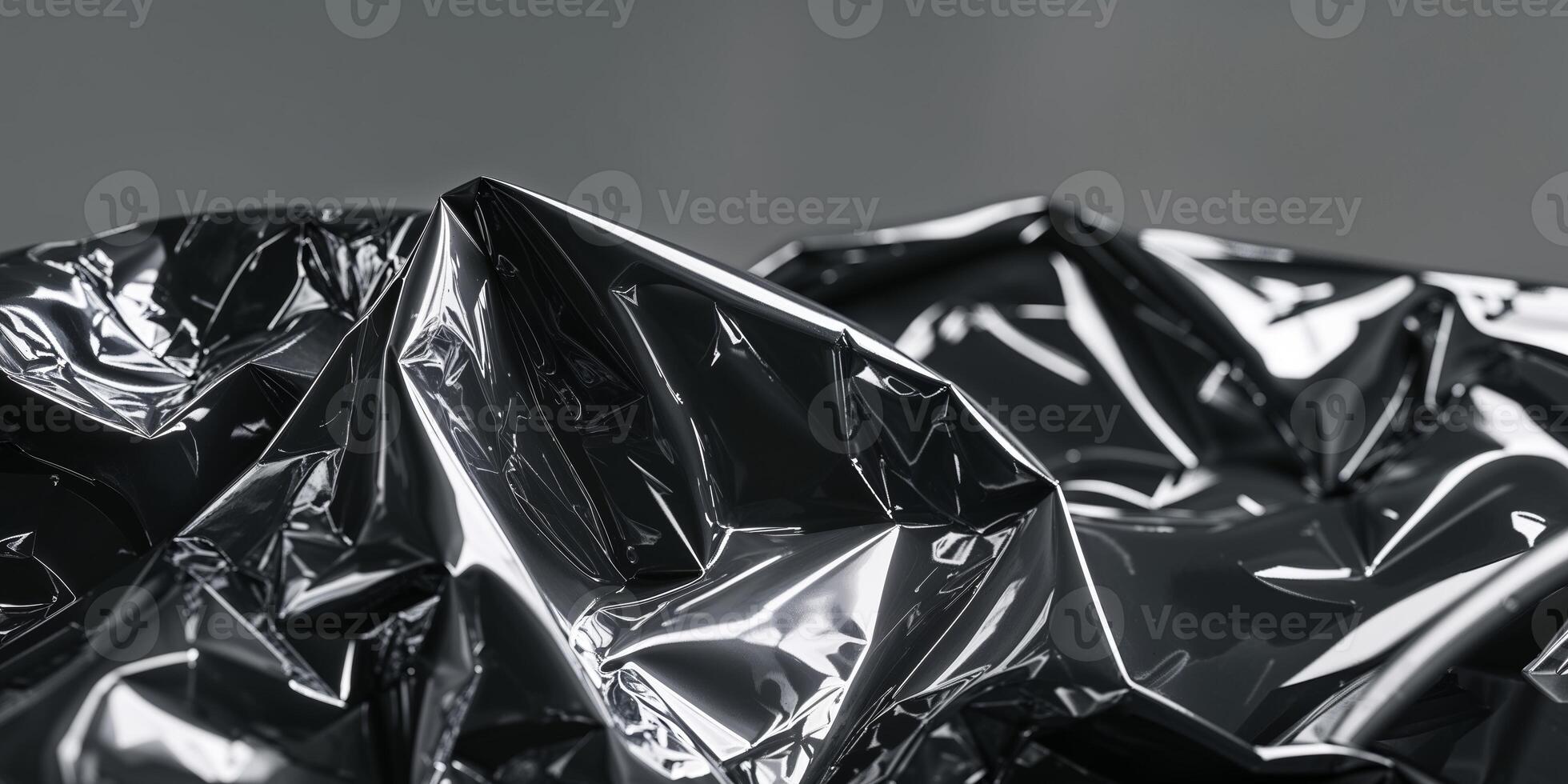 Wrinkled Shiny Dark Plastic Sheet with Reflective Surface Texture photo