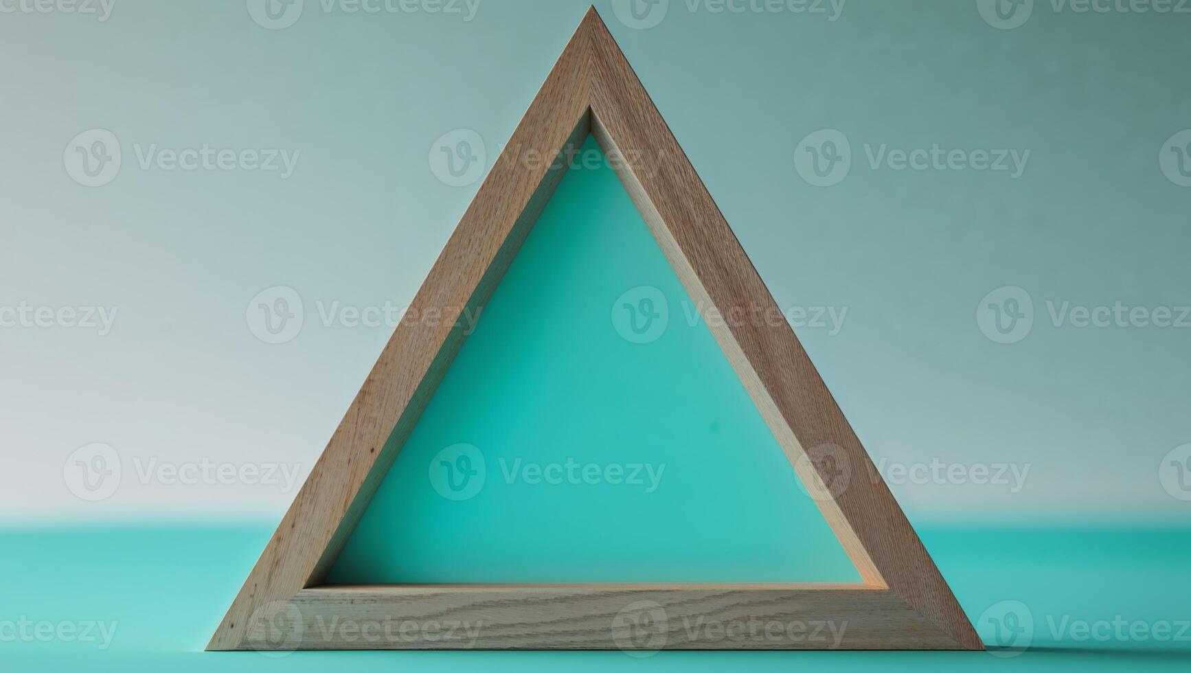 Wooden Triangle Frame on Teal Background photo
