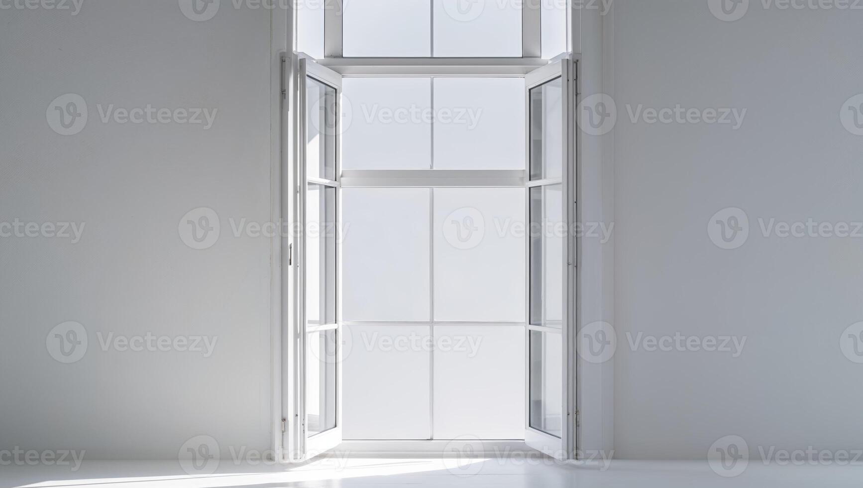 An empty room with a white wall and a window photo