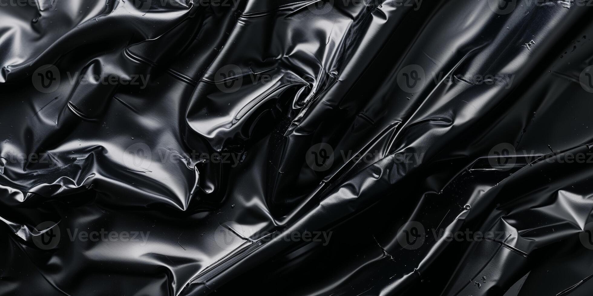 Black plastic fabric background photo