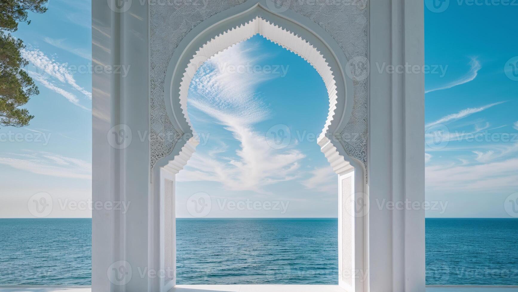 A white archway with a view of the ocean photo