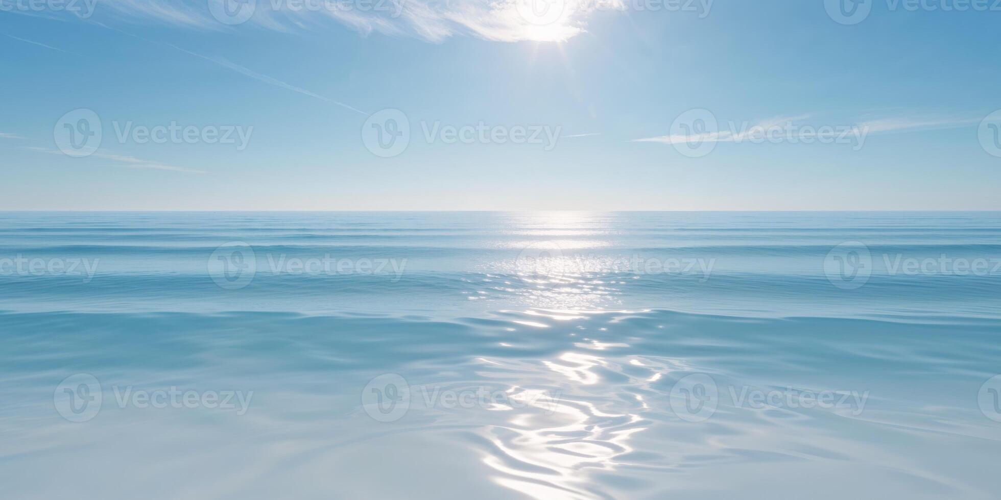 A blue ocean with a sun shining over it photo