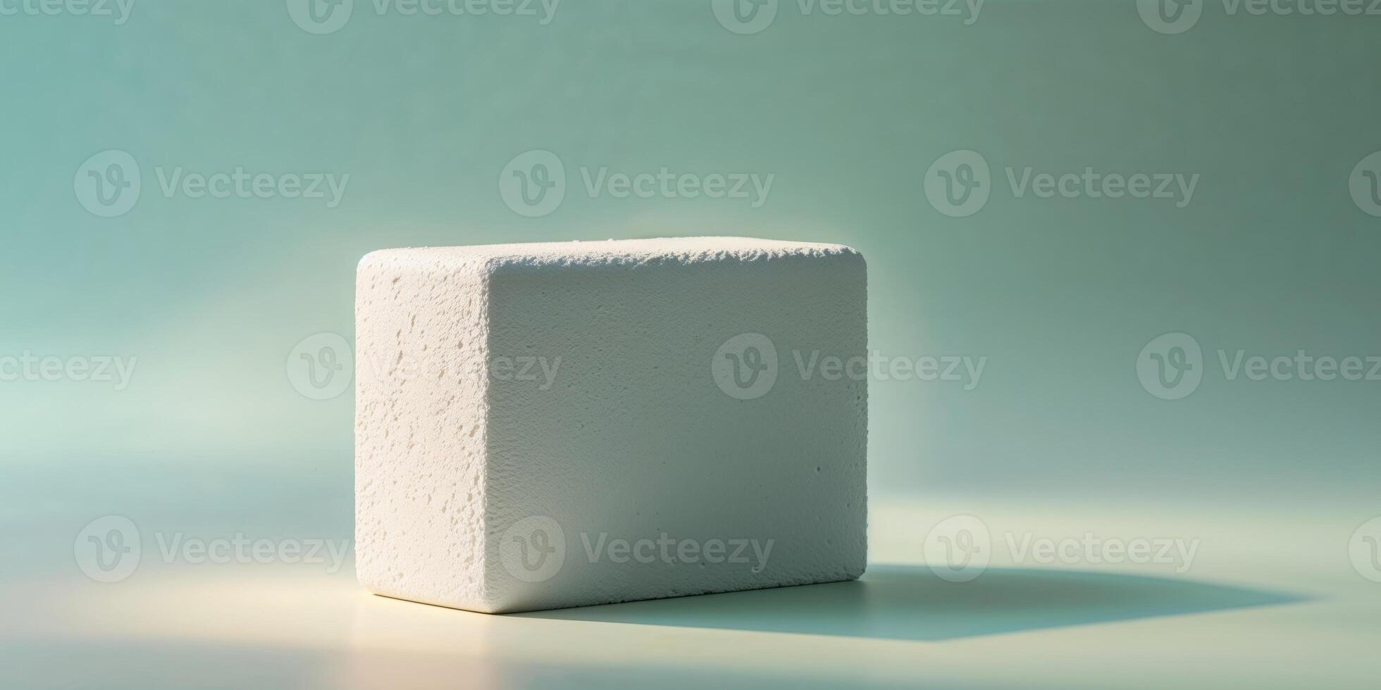 White Textured Block on Pastel Blue and Green Background. photo