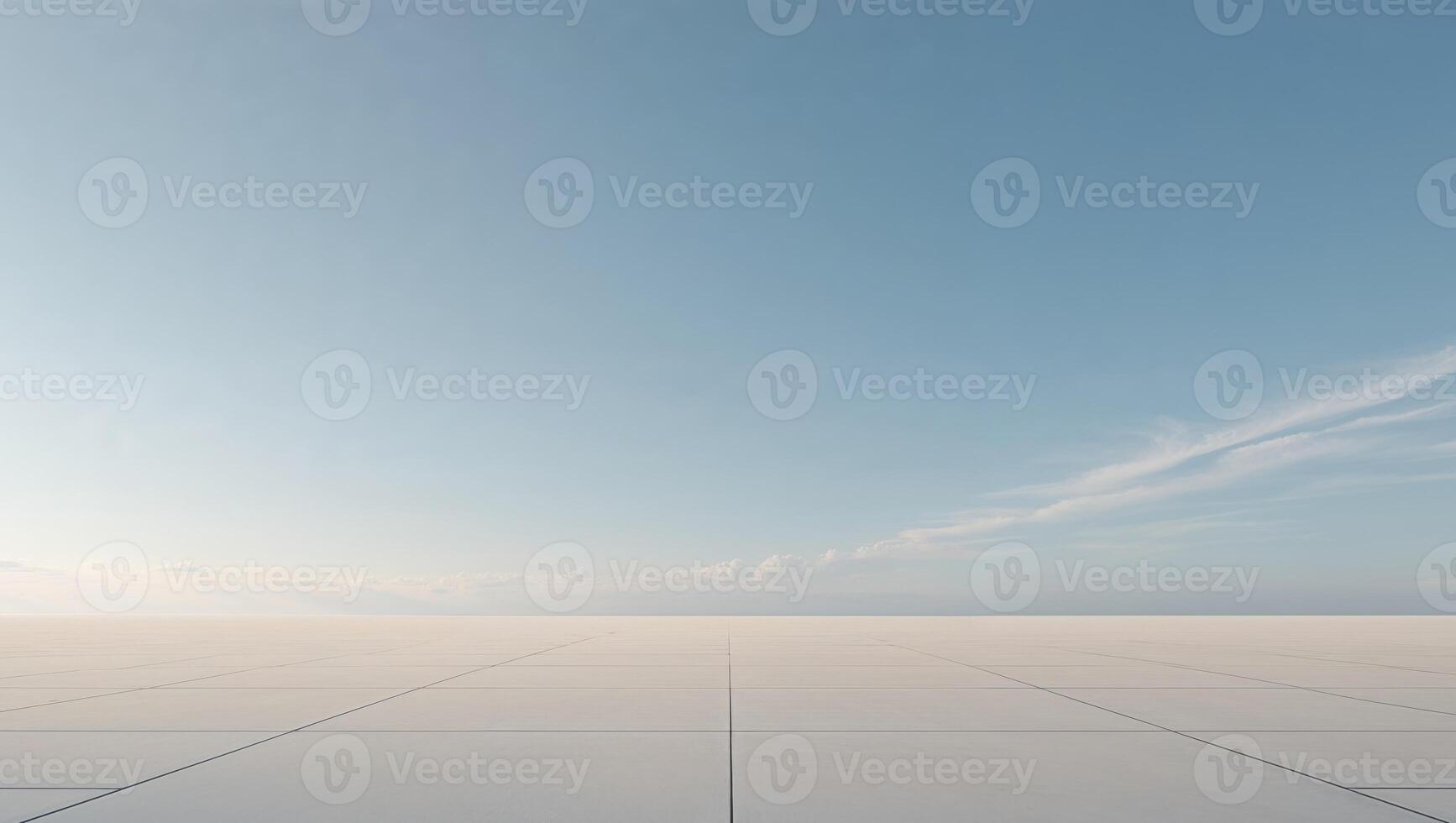 Expansive open area with a clear sky in the background representing freedom and space ideal for various applications photo