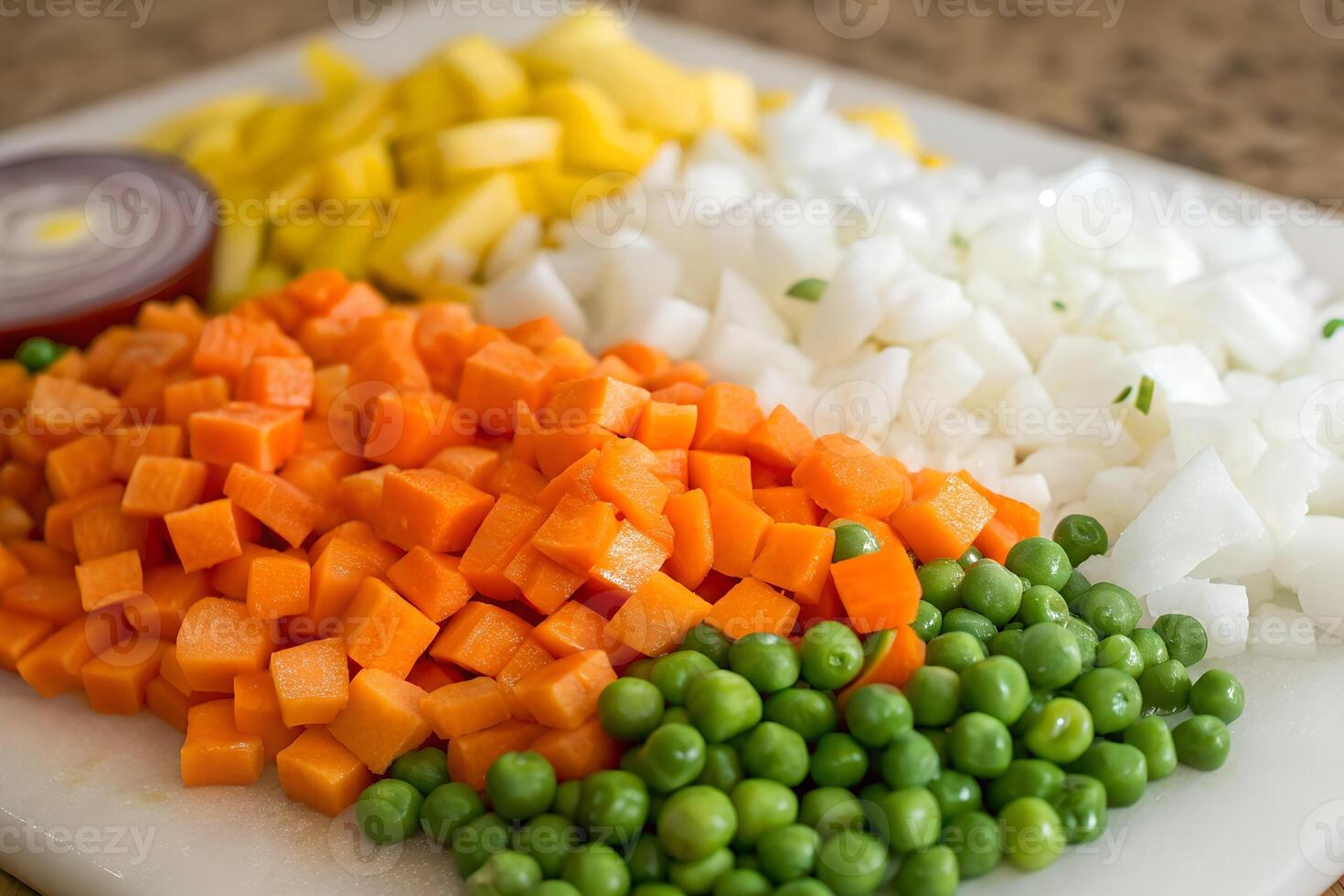 Freshly Chopped Carrots, Green Peas, and Onions Healthy Ingredients photo