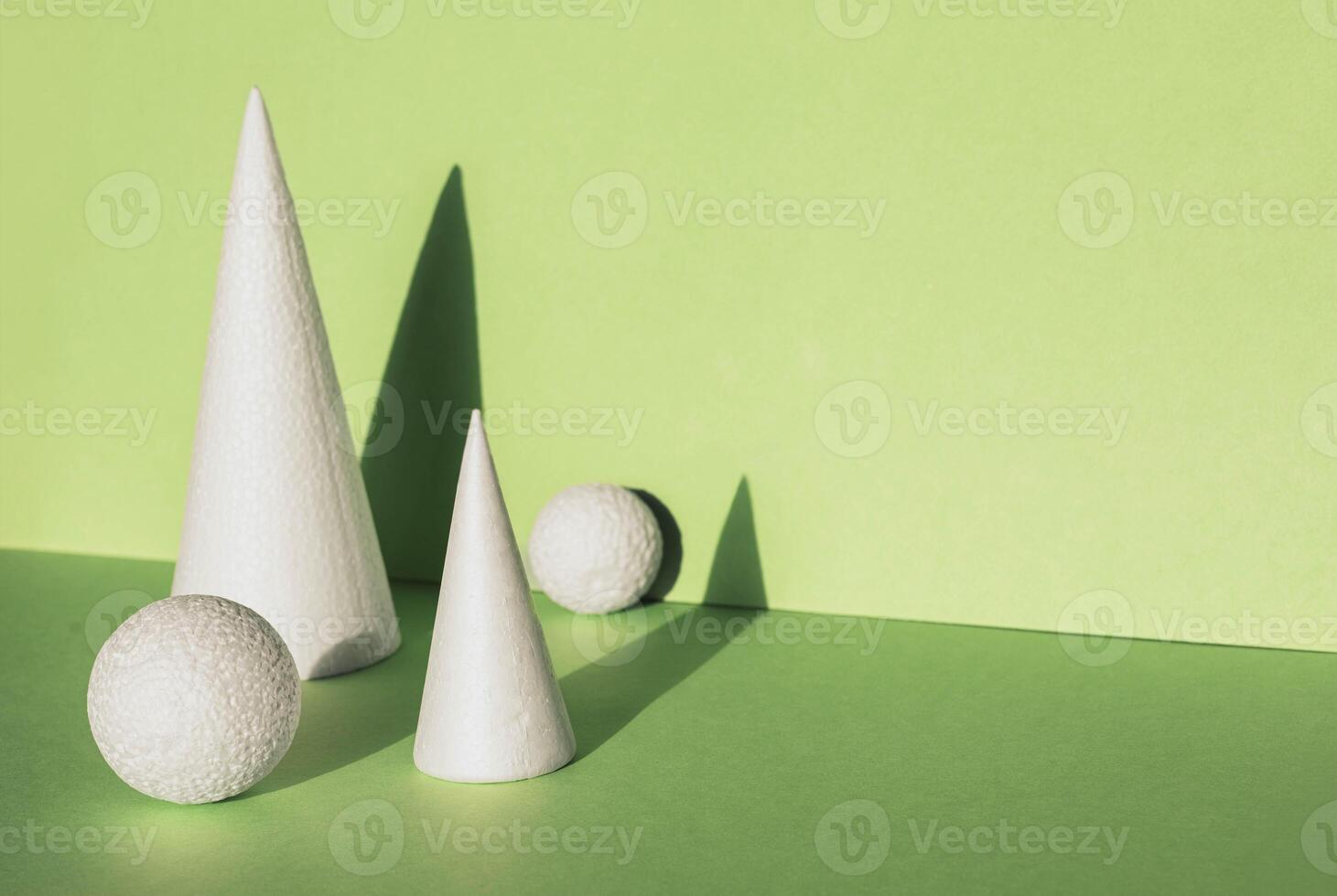 Enchanting Christmas Magic. Mini Trees and Balloons Adorn Green Canvas with Holiday Spirit. Copy space photo