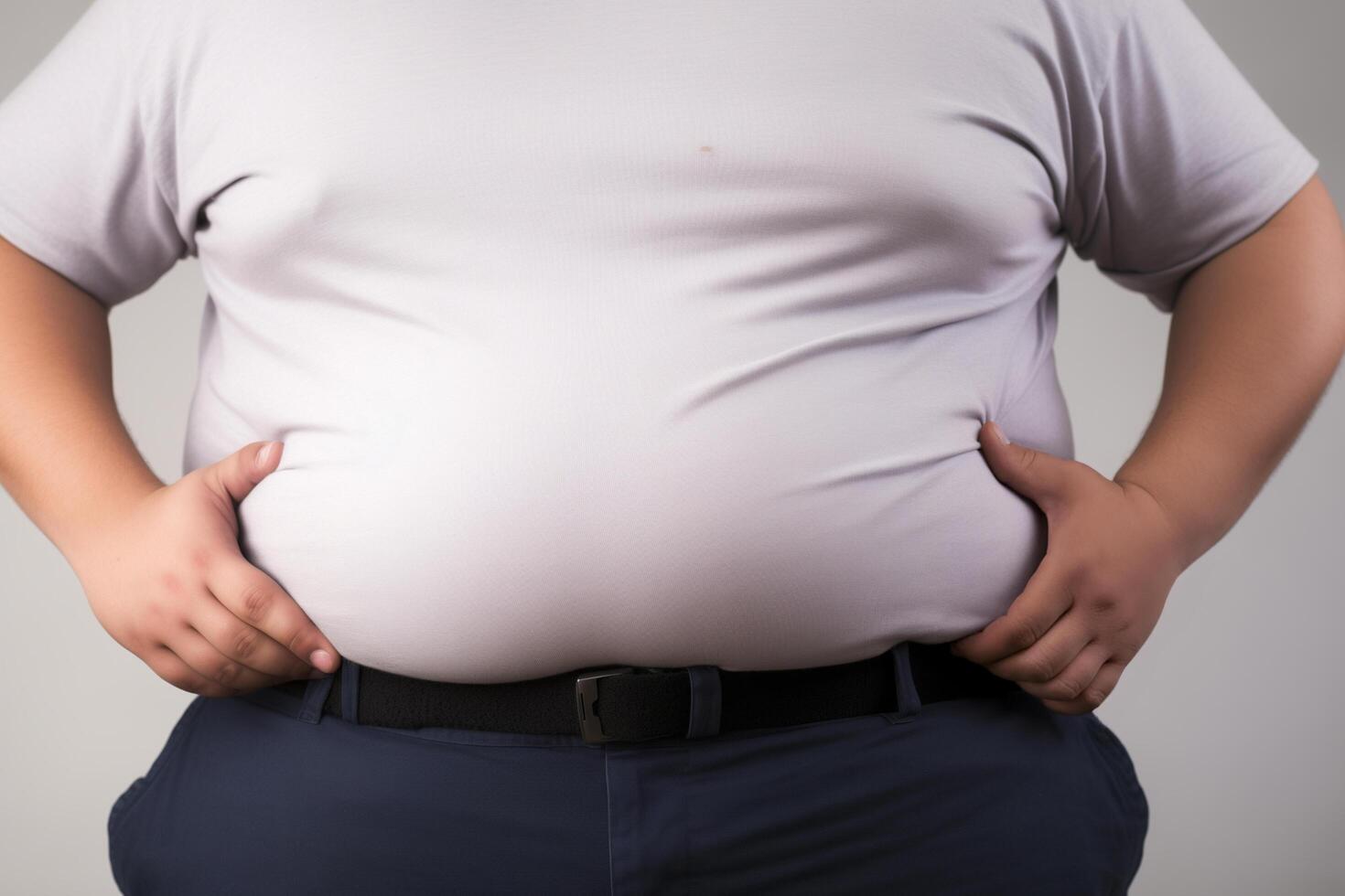 chubby man's large belly in focus, isolated on a pure white background, wearing an unbuttoned shirt photo