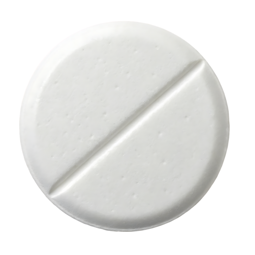 Close up of a single white pill, scored in half. png