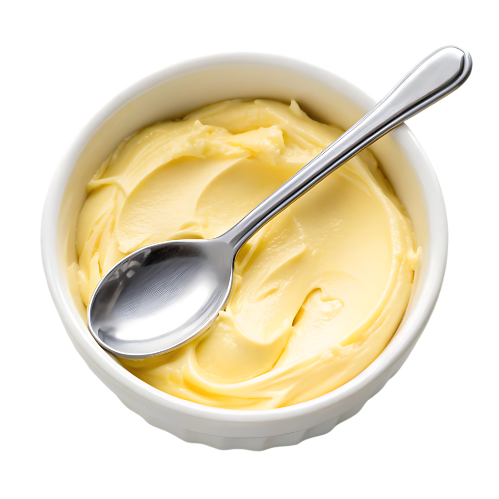 Close up of creamy butter in a bowl with a spoon. png