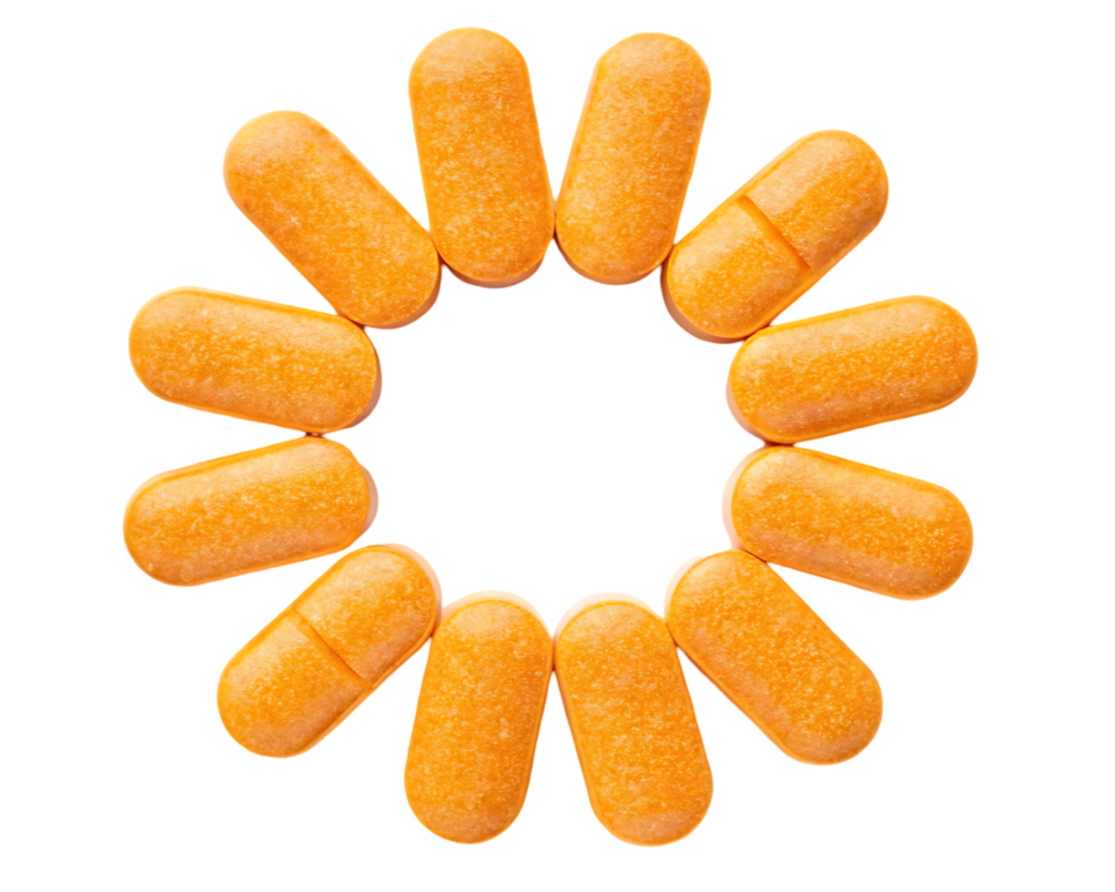 Orange pills arranged in a circle, isolated on white background. png