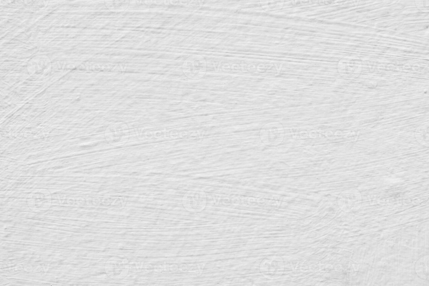 White plaster texture. Architectural abstract background. Light background of paint strokes with a wide brush. photo
