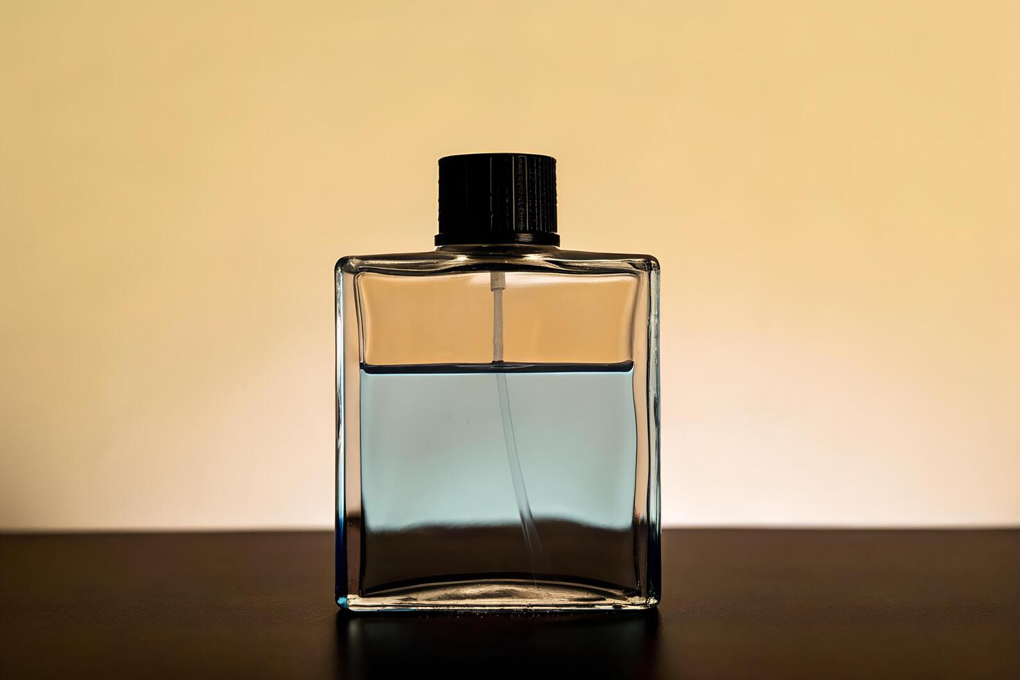 A bottle of perfume sitting on a table photo