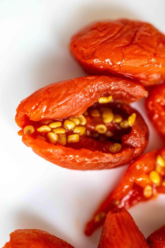 The goji berry, also known as wolfberry pinyin, is the sweet fruit of Lycium barbarum or Lycium chinense, two closely related species of thornbush in the nightshade family, Solanaceae macro photo