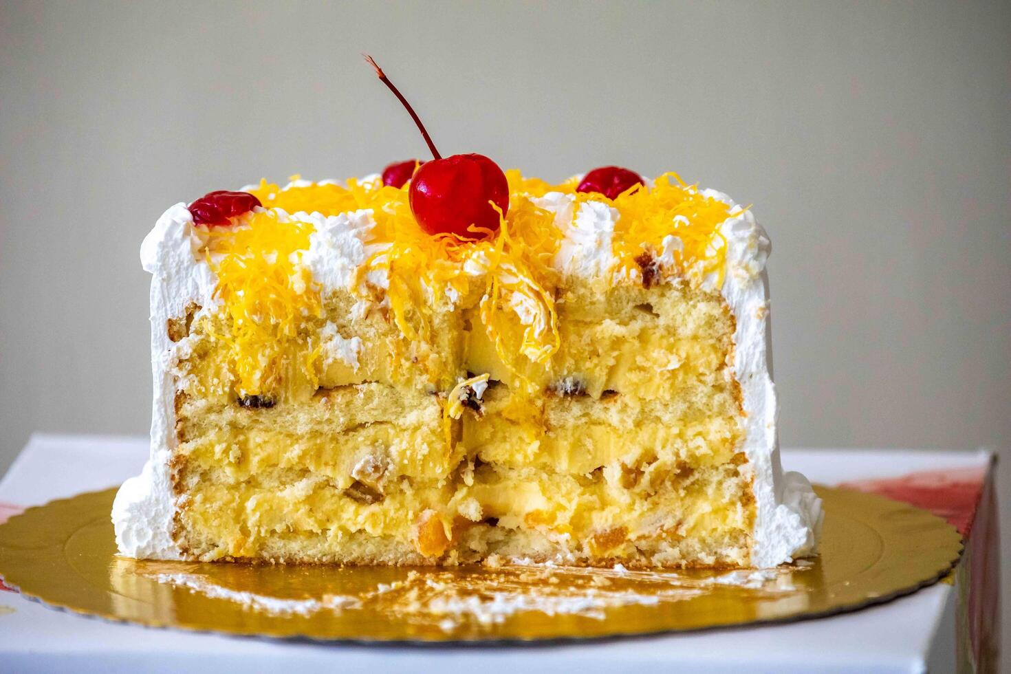 Classic Marta Rocha cake pie developed in honor of Miss Brazil made with egg thread, baba de moca, walnuts, cherry and dried plum photo