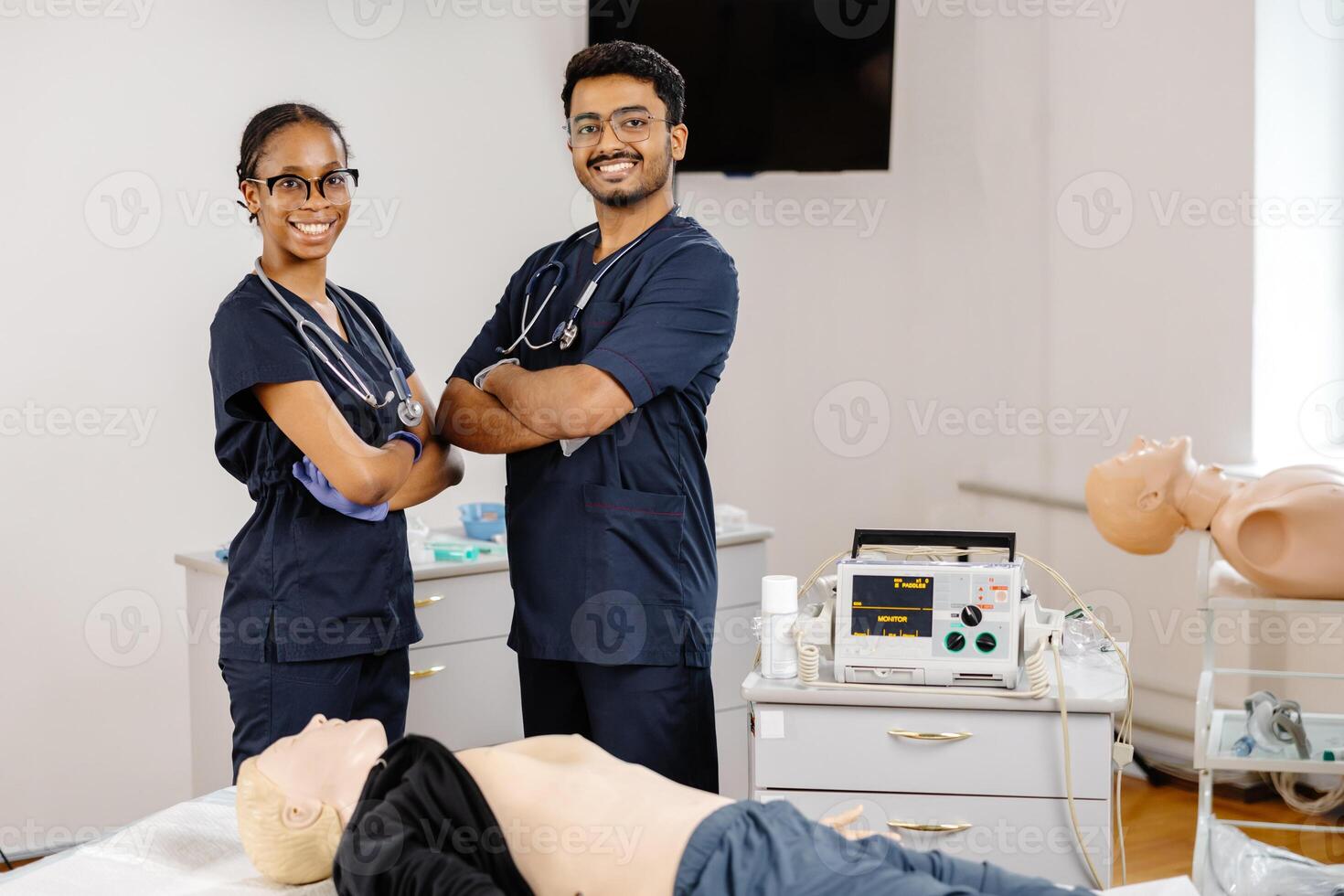 Generated imageMedical Students Practicing CPR Training with Defibrillator and Mannequin photo