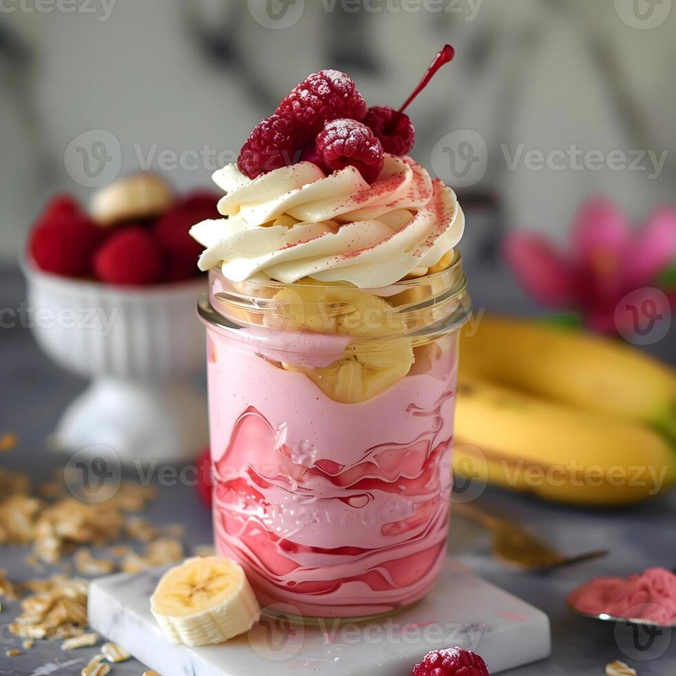 Vibrant Dessert Close-Up with Whipped Cream and Cherry photo