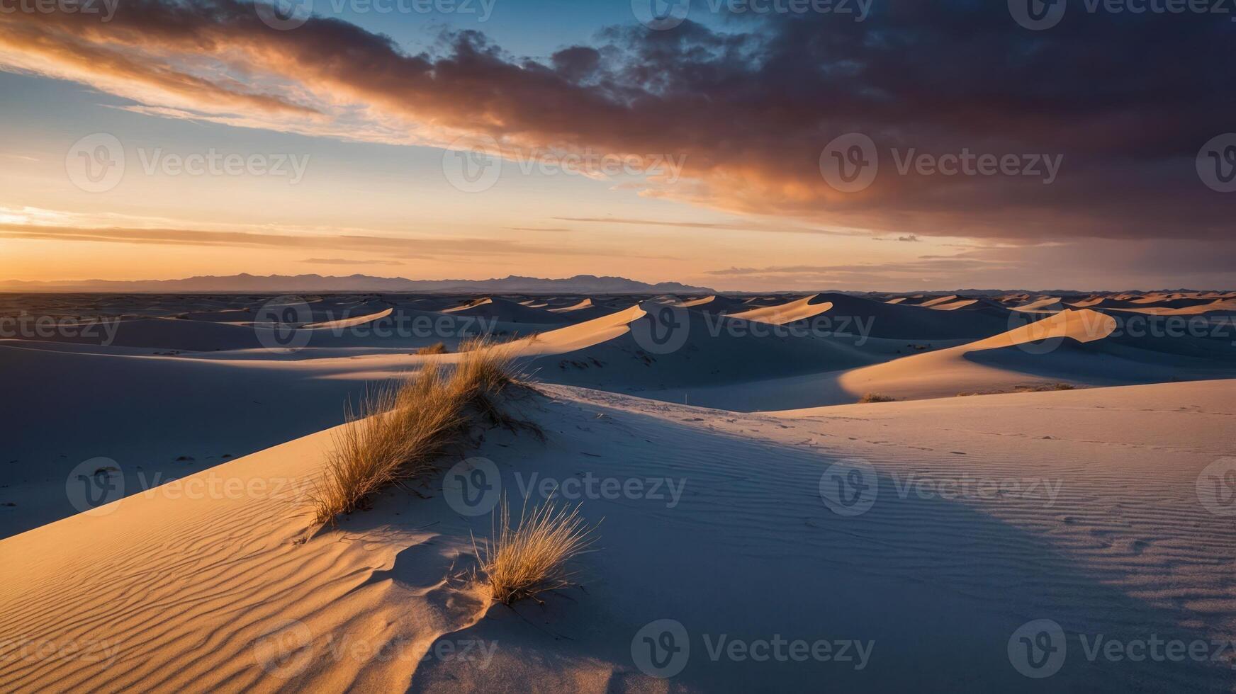 Serene desert landscape at sunset with rolling sand dunes and soft clouds. photo