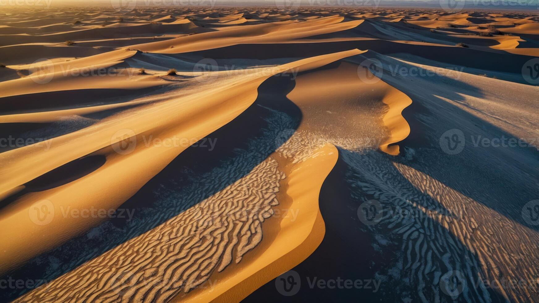 Scenic view of sand dunes at sunset, showcasing natural patterns and textures. photo