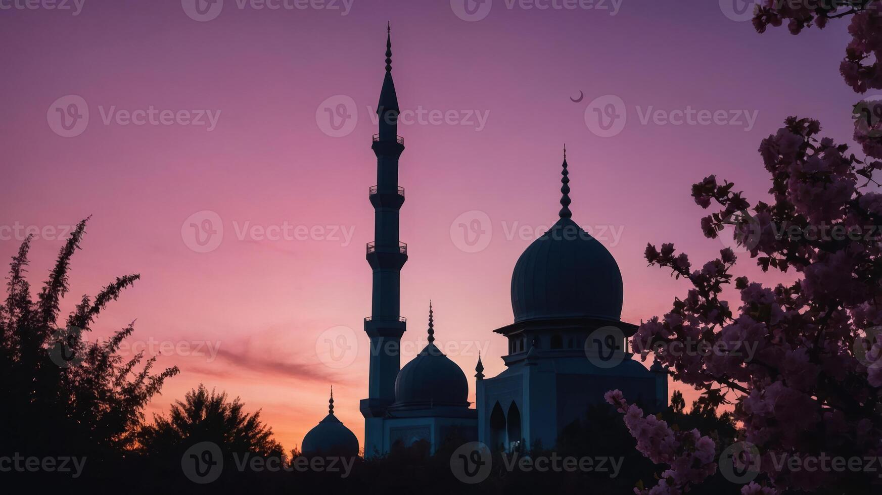 A silhouette of a mosque against a colorful sunset sky. photo