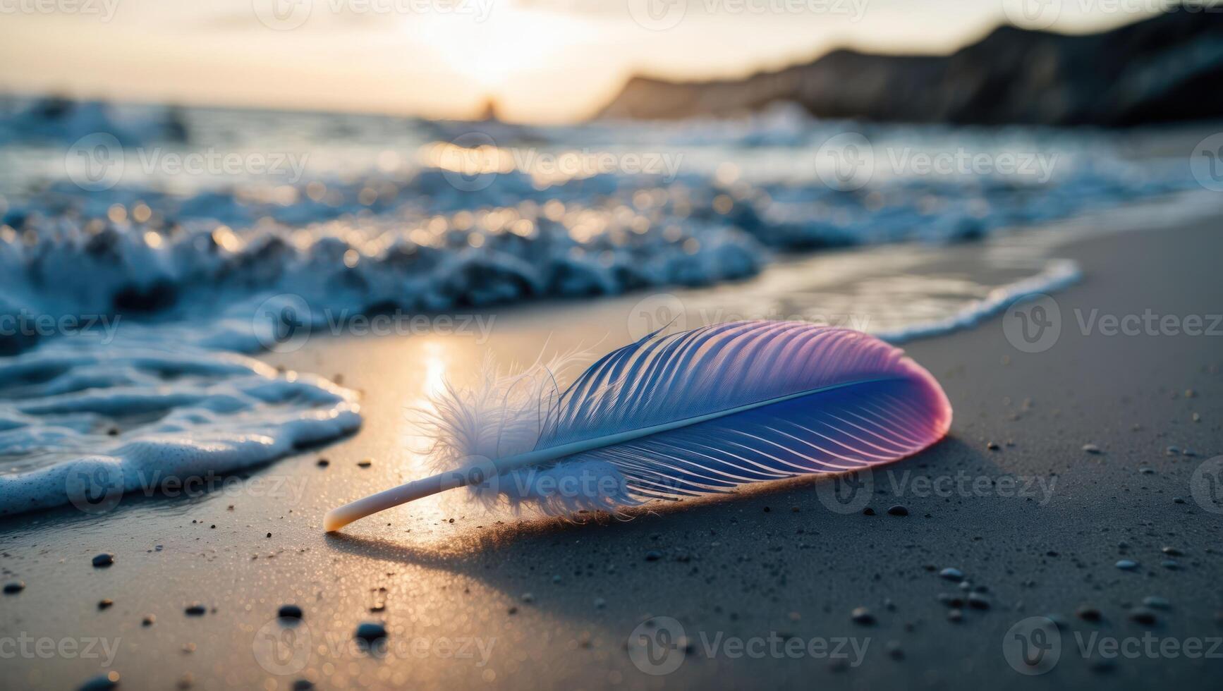 Feather Resting on Sandy Beach with Waves at Calming Sunset photo