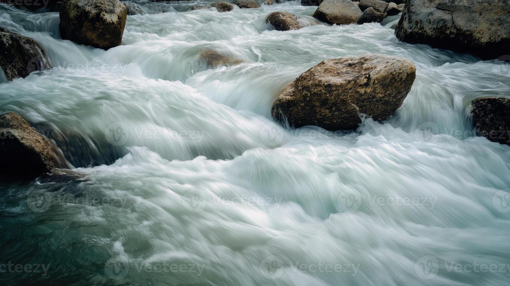 Close up captures intense whitewater rushing over river stones photo