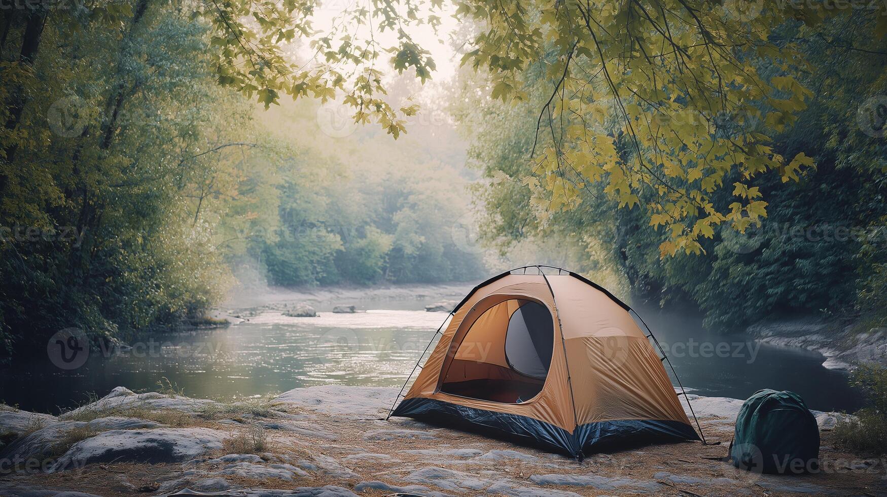 A tent nestled by the river in a forest, providing the ultimate escape photo