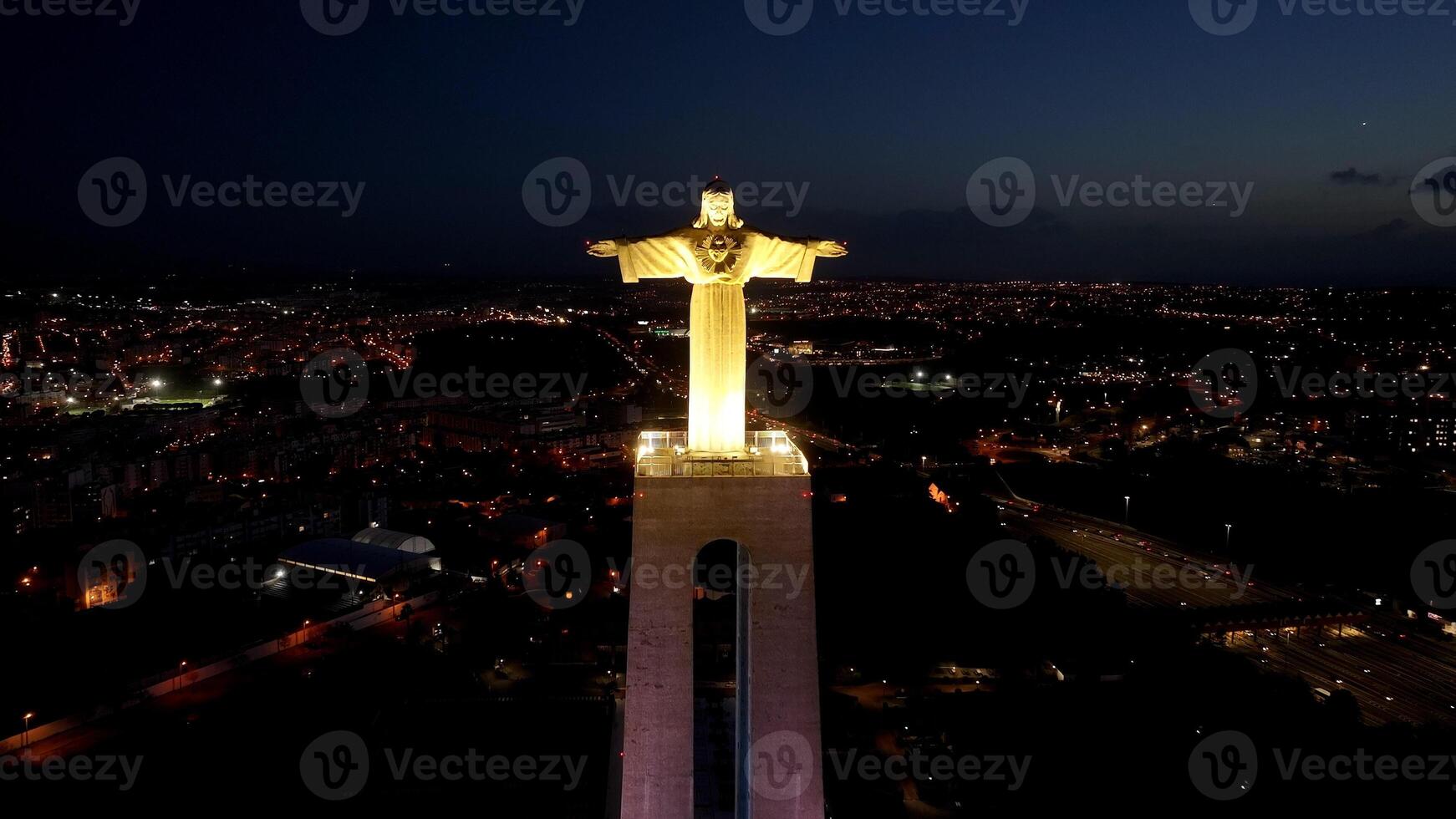 Aerial Landscape of king christ in Almada District of Lisbon in Portugal . Scenery 25Th April Bridge. photo