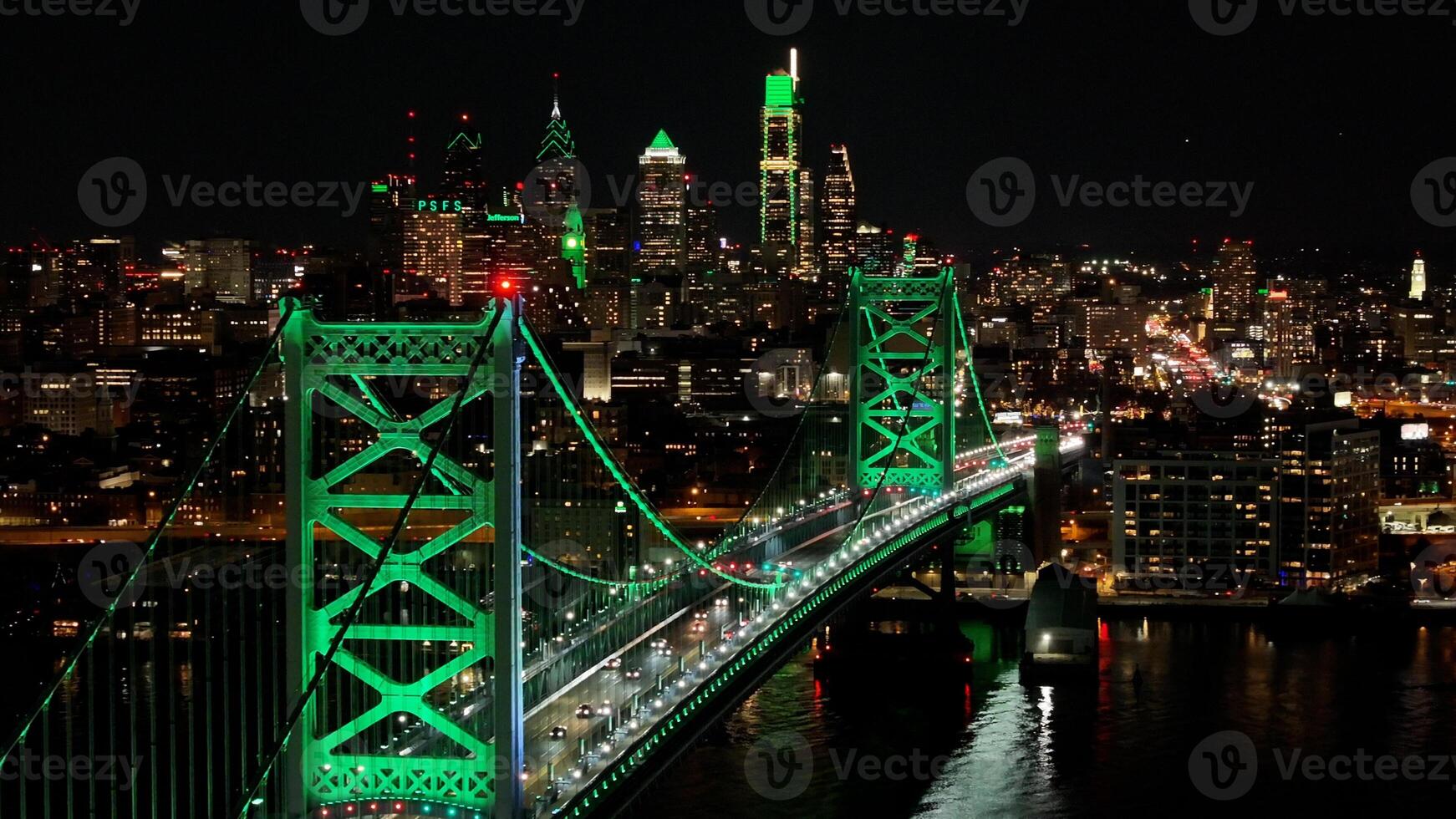 Outdoor Benjamin Franklin Bridge in Philadelphia Pennsylvania United States. Night City Traffic Lights. photo