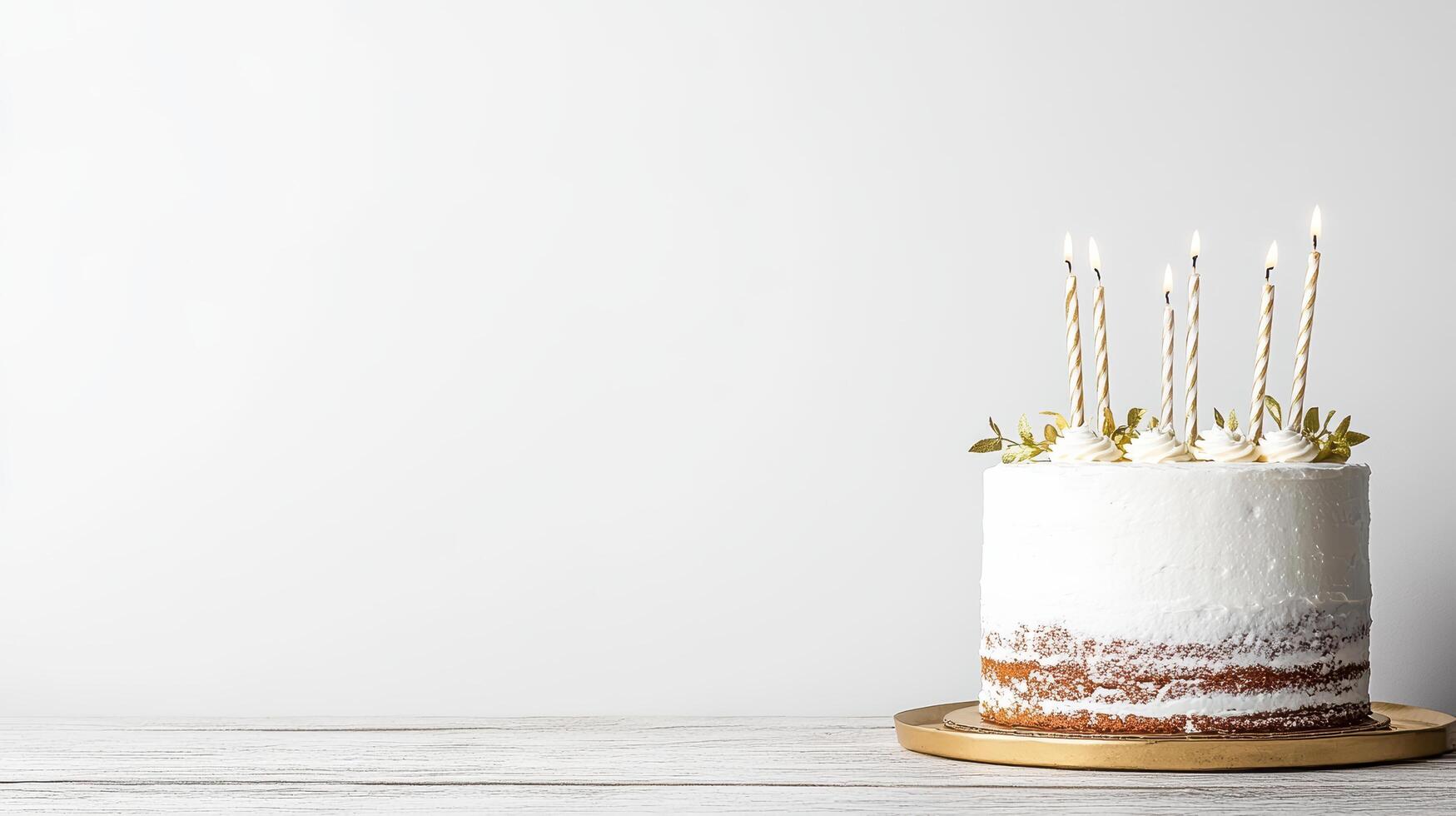 A white cake with candles on top photo