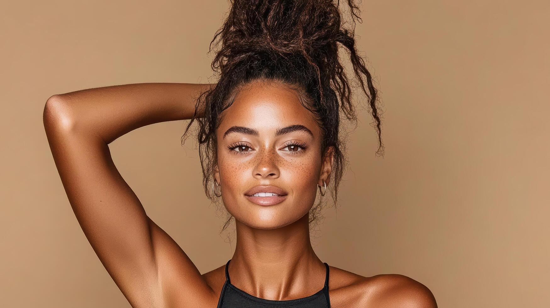 Beautiful young woman with dreadlocks posing for a photo