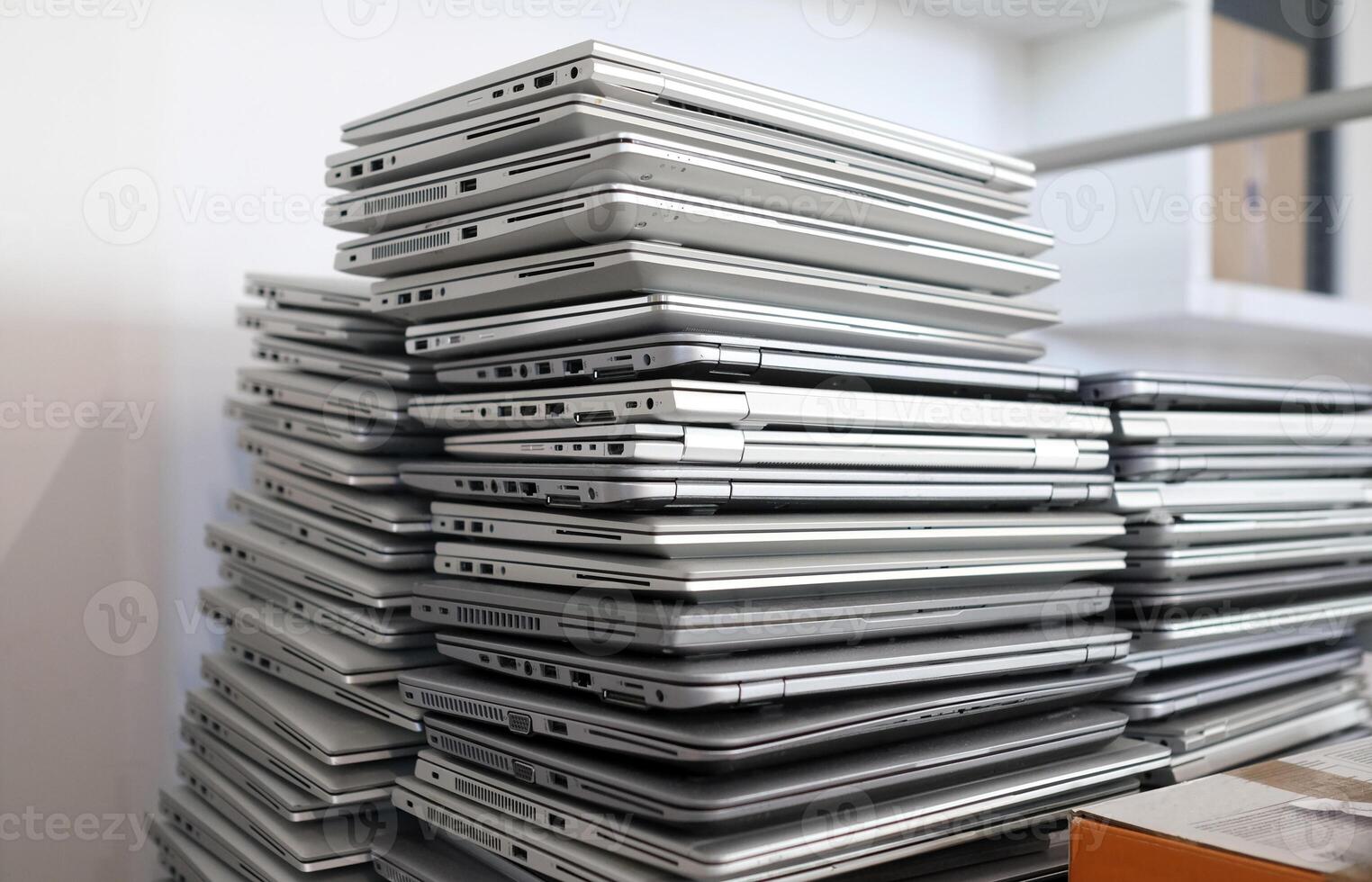 E-waste - pile of laptops to be discarded photo