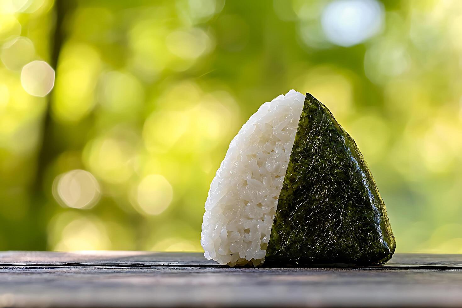 A piece of rice on a table photo