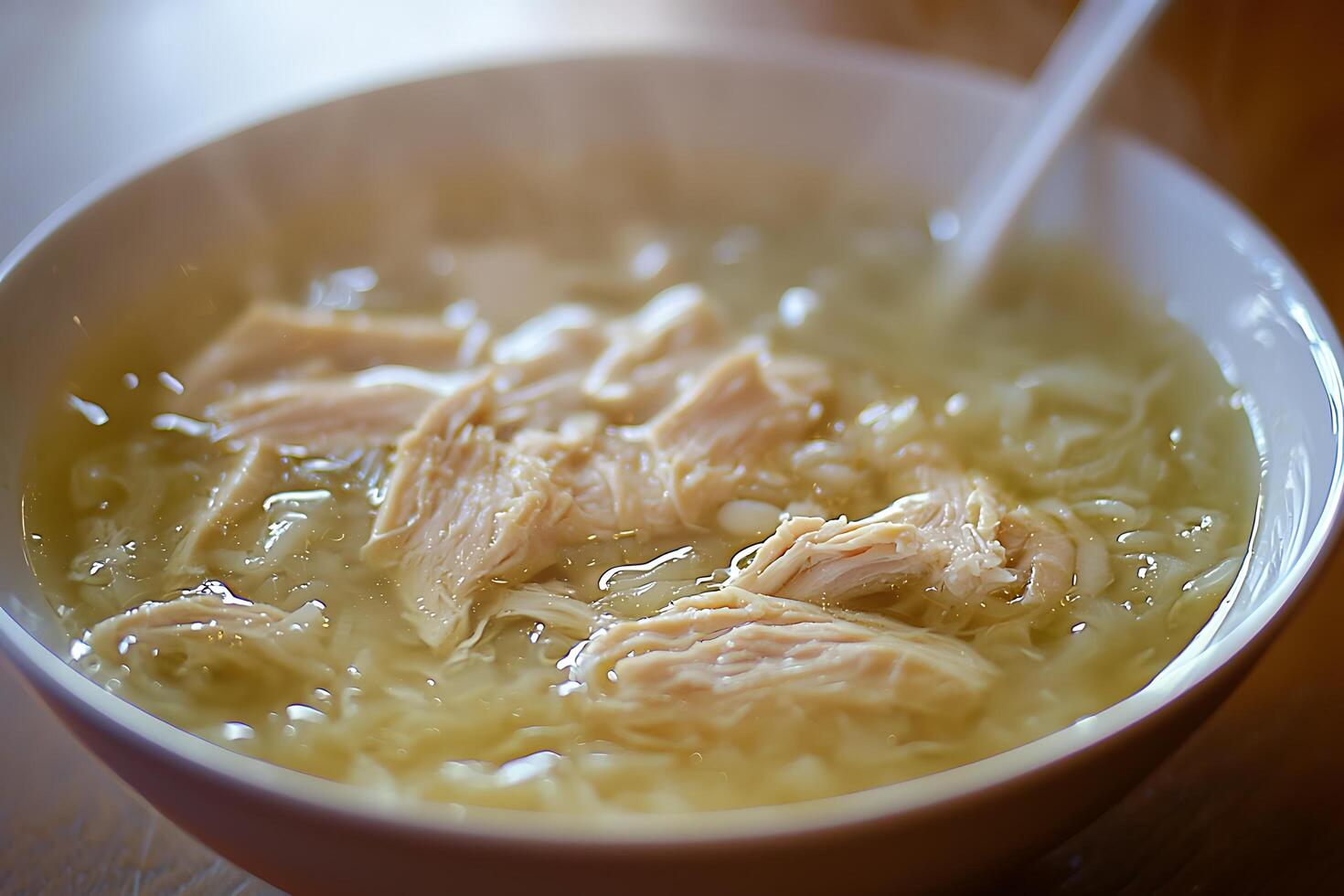 Close-up of Chicken Noodle Soup in a Bowl. A steaming bowl of comfort food, perfect for a cozy meal. photo