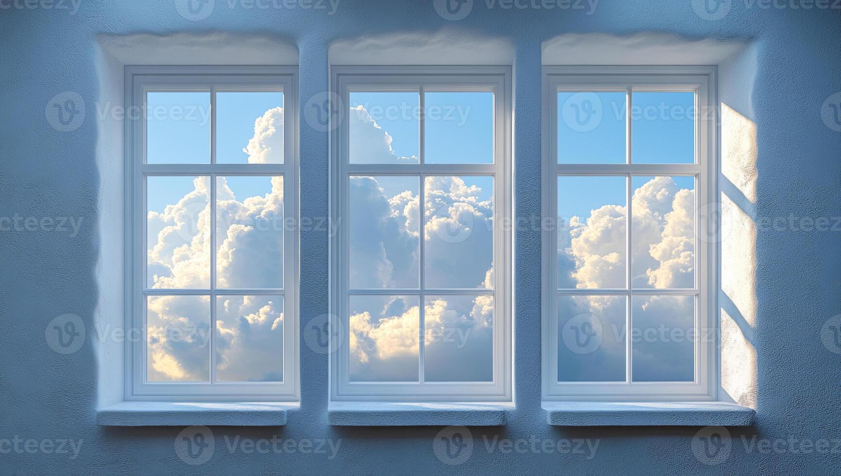 Clouds visible through large windows. Three windows frame a beautiful view of fluffy white clouds against a bright blue sky. Light streams through gracefully. photo