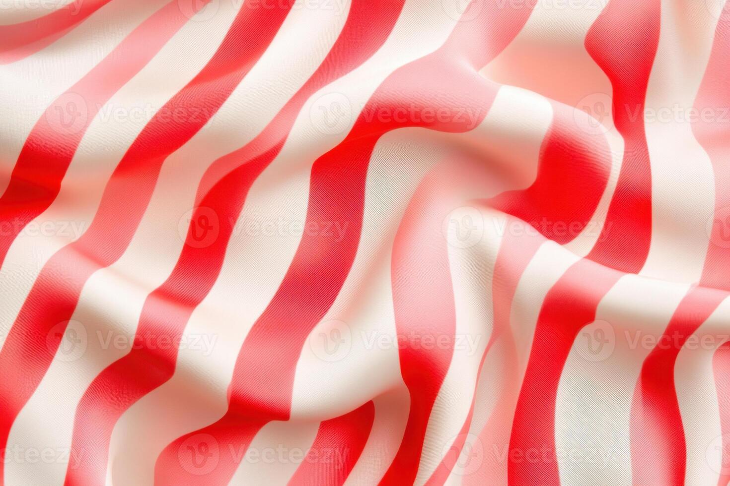 Textured blush and red striped textile pattern showcasing detailed fabric folds and vibrant colors perfect for design inspiration photo
