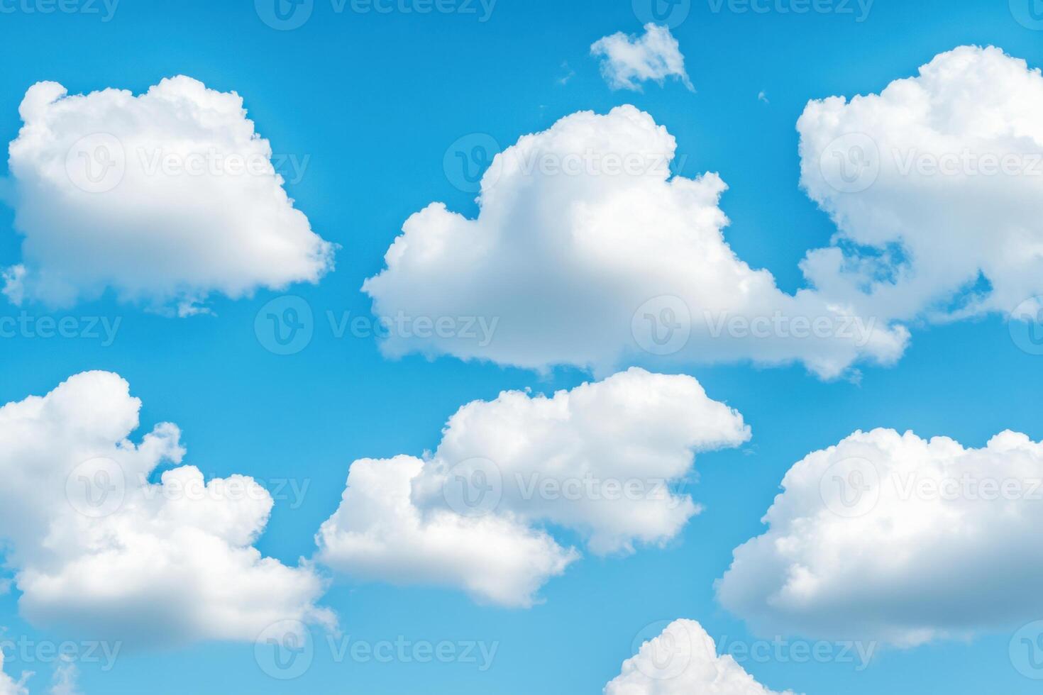 Serene spring sky in soft baby blue with delicate white clouds creating a calm atmosphere photo