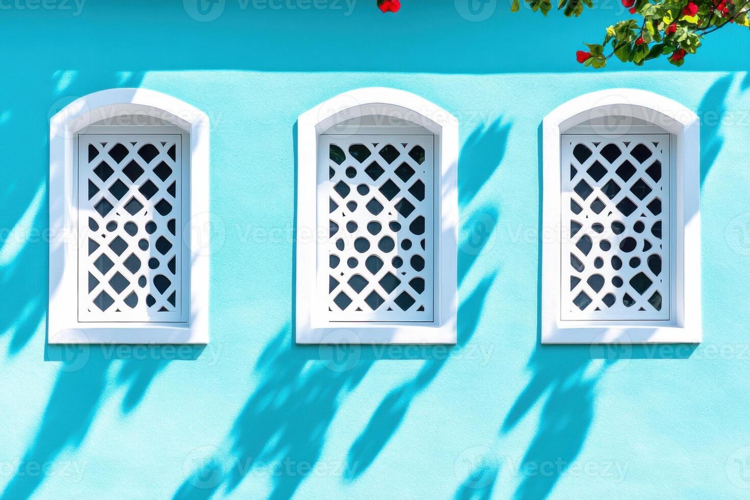 Creative architectural facade featuring bold baby blue color and geometric patterns in urban setting photo