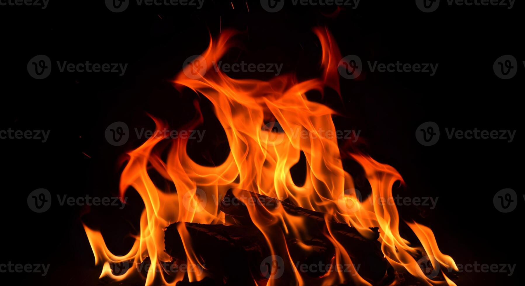 Burning Brightly, An intense display of orange flames against a dark background photo